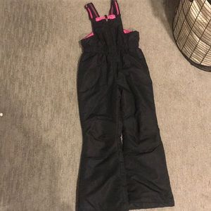 Black and pink snow pants